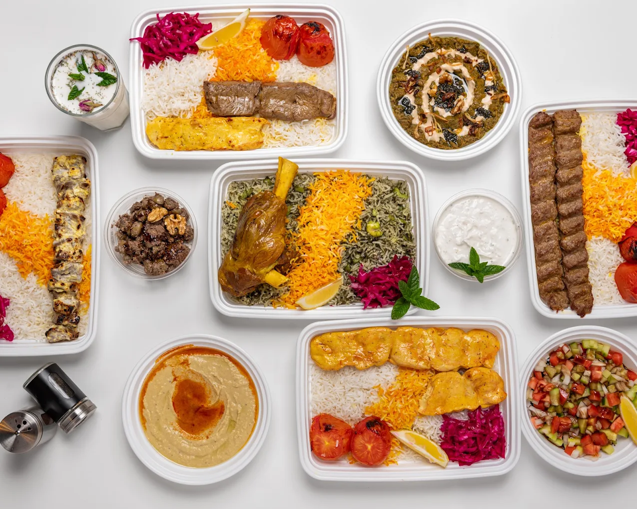 Persian takeout spread — kababs, saffron rice, stews and dips